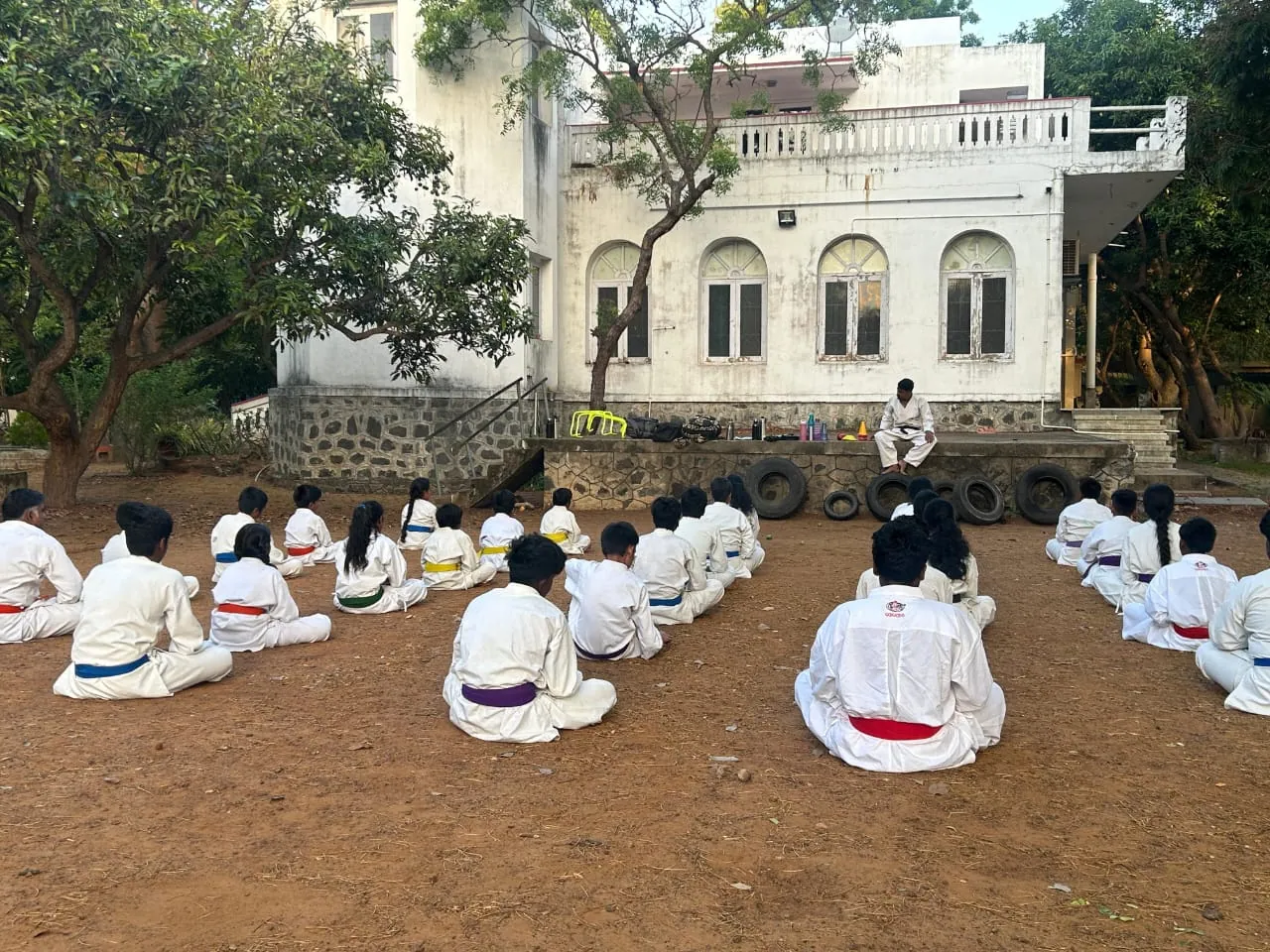 Outdoor group karate practice